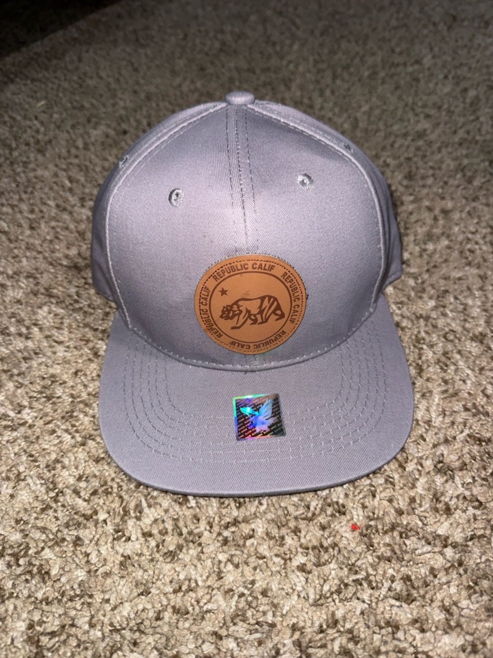 Gray Snapback Hat with Tan Leather Logo Patch